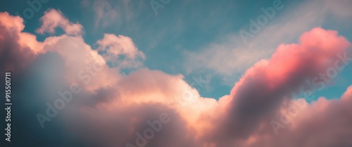 Wallpaper Mural Dramatic clouds illuminated by sunset colors create a serene and inspiring atmosphere in the sky Torontodigital.ca