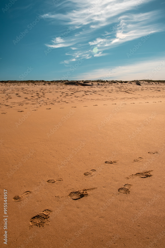 A tranquil beach scene, a rocky outcrop, and the soft sand, capturing the serene beauty of coastal nature. A tranquil beach scene, a rocky outcrop, and the soft sand, capturing the serene beauty of coastal nature.