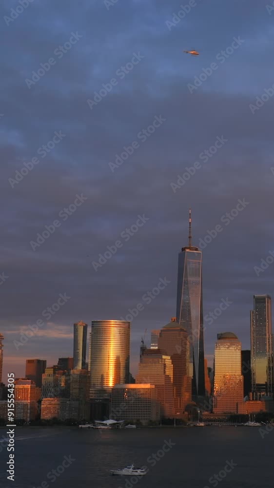 Sunset view of the Manhattan skyline, New York, USA. Vertical video. Sunset view of the Manhattan skyline, New York, USA. Vertical video.