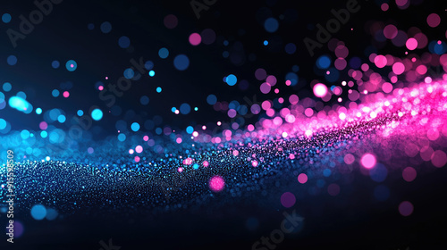 A vibrant swirl of sparkling particles in blue and pink against a dark background, evoking a sense of motion and depth.