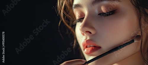 Young woman applying makeup...