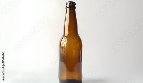 Empty Brown Glass Beer Bottle on Pure White Background photo