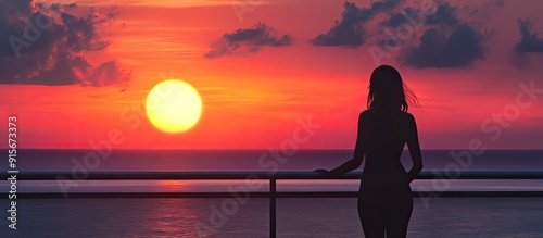 Silhouette of a young woman...