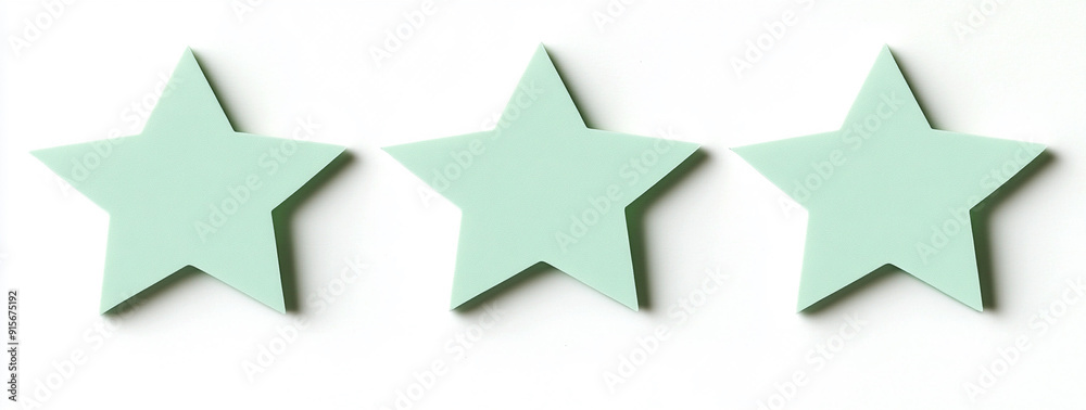 pastel green star-shaped sticky notes, isolated on a white background pastel green star-shaped sticky notes, isolated on a white background