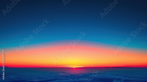 Breathtaking sunset over the horizon, showcasing vibrant colors blending seamlessly in the evening sky.