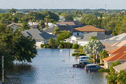 Hurricane Debby flooded homes and cars in Laurel Meadows community in Sarasota, Florida. Aftermath of natural disaster photo