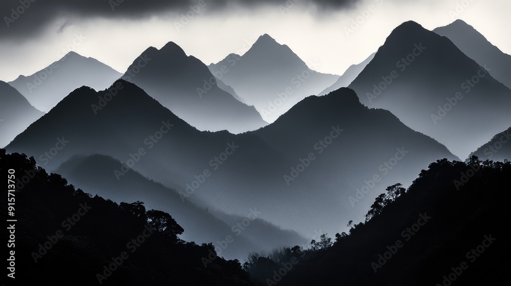 Fototapeta premium Sinister silhouette of looming mountains