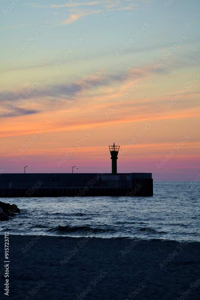 Colourful sunset on the sea coast of the Baltic sea. Colourful sunset on the sea coast of the Baltic sea.