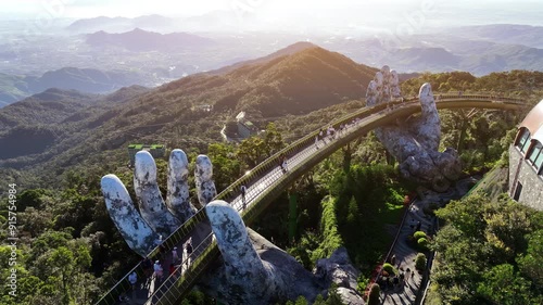 Tourist walking at Golden bridge in Bana hills, Da nang, Vietnam.