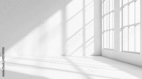 Sunlight streaming through a window onto a white room floor