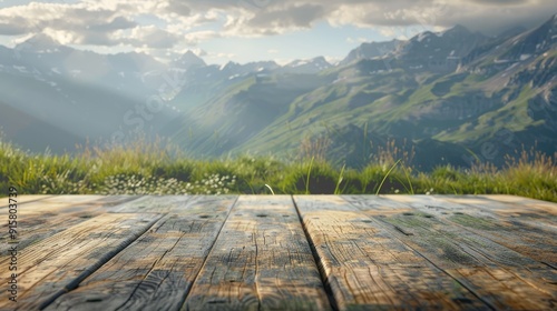 Mountains and grass in the background of a wooden table for a fresh and relaxed concept, suitable for product display or key visual design with available space for text.