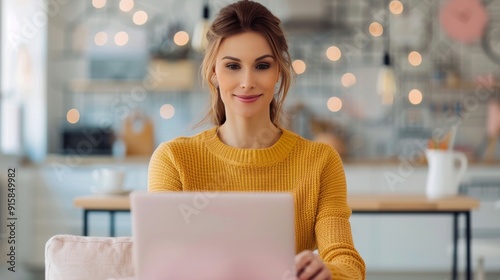 Woman Working on Laptop in Modern Workspace With World Map on Wall
