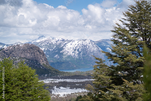 aerial view over trail in Patagonia mountains in San Martín de los Andes in summer with snow