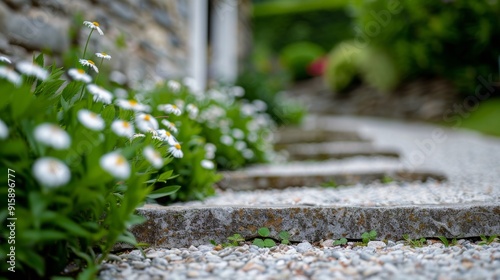 Serene Garden Pathway Leading To Charming House Surrounded By Colorful Flowers