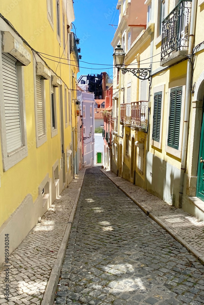 Alley in the old town of Lisbon, Portugal Alley in the old town of Lisbon, Portugal