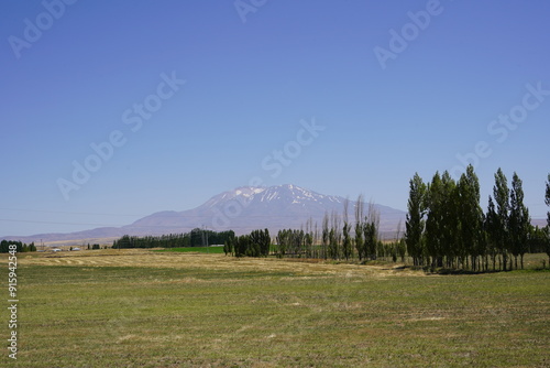 Majestic Mount Süphan: Turkey’s Dormant Stratovolcano Under Azure Skies. photo