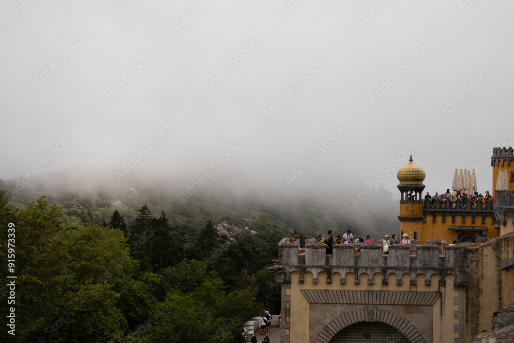 A fairytale castle peeks out from the clouds offering breathtaking views to those brave enough to climb to its heights A fairytale castle peeks out from the clouds offering breathtaking views to those brave enough to climb to its heights
