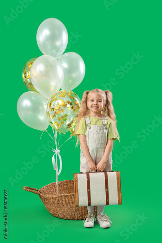 Happy little girl with suit...