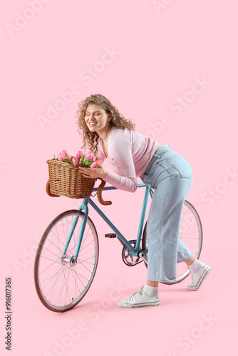 Happy young woman with bouq...