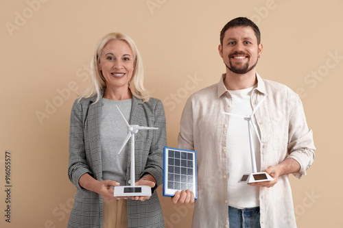 People with wind turbine mo...