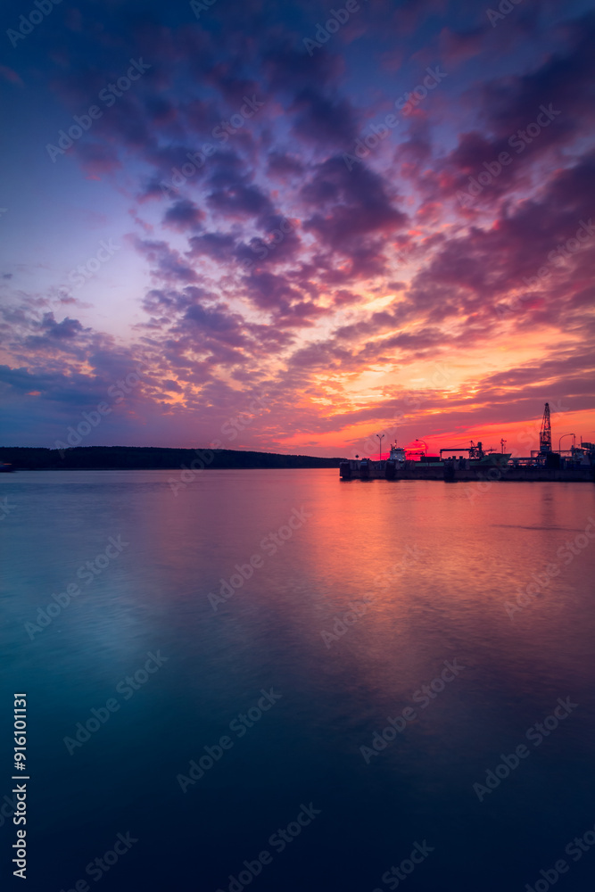 Silhouette of a ship in port of Klaipeda at sunset, Lithuania Silhouette of a ship in port of Klaipeda at sunset, Lithuania
