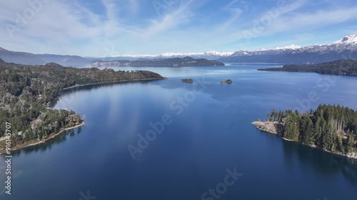 San Patricio Bay Water At Villa La Angostura In Neuquen Argentina. Snow Capped Mountains. Angostura Village. Winter Travel. San Patricio Bay Water At Villa La Angostura In Neuquen Argentina. photo