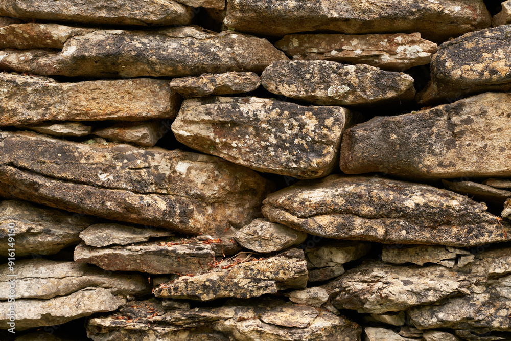 closed view of wall of stones and rocks closed view of wall of stones and rocks