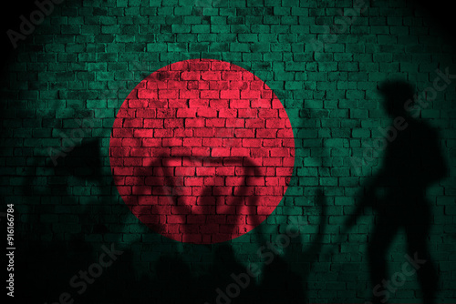 bangladesh flag painting on brick wall and Protesters shadow photo