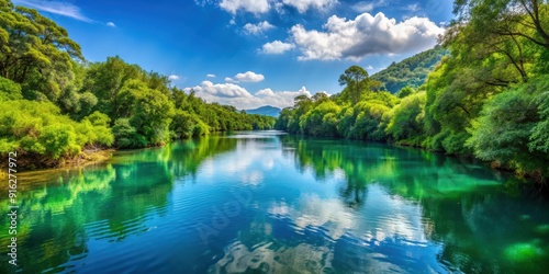 Scenic river view with lush greenery and clear blue water, river, view, nature, landscape, scenic, water, greenery