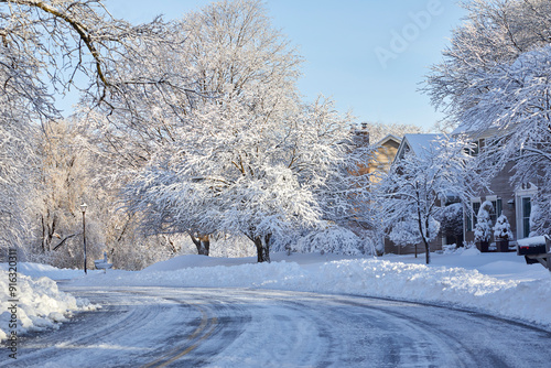 Icy road covered in snow and ice in winter near Minneapolis Minnesota USA