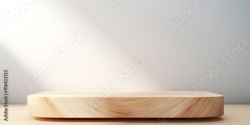 Empty minimal natural wood table podium in sunlight, shadow on white wall for luxury cosmetics.