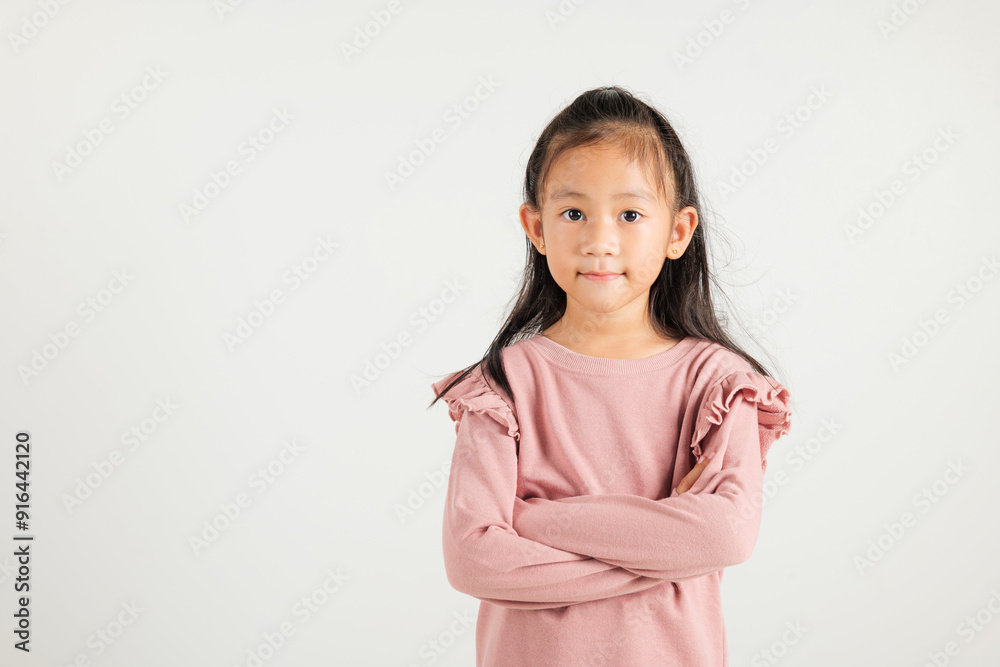 Asian happy portrait cute young kid girl smiling confidence with arms crossed studio shot isolated on white background and copy space, kindergarten children person lifestyle arm folded Asian happy portrait cute young kid girl smiling confidence with arms crossed studio shot isolated on white background and copy space, kindergarten children person lifestyle arm folded