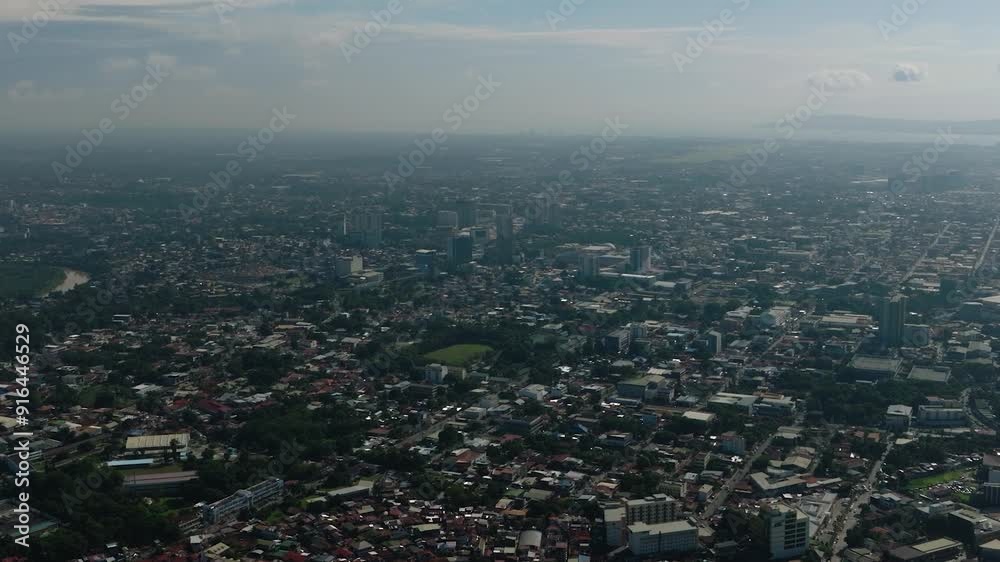 Davao City with residential area and modern buildings. Mindanao, Philippines. Davao City with residential area and modern buildings. Mindanao, Philippines.
