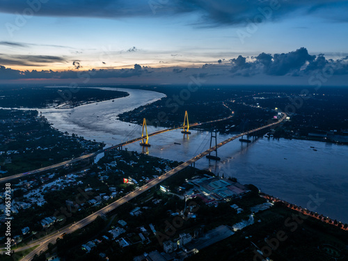 Aerial view of My Thuan 2 bridge during sunset with colorful light photo