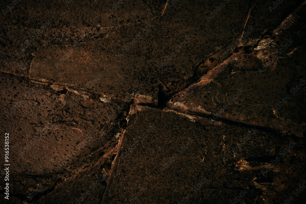 Fototapeta premium Dark cracked stone