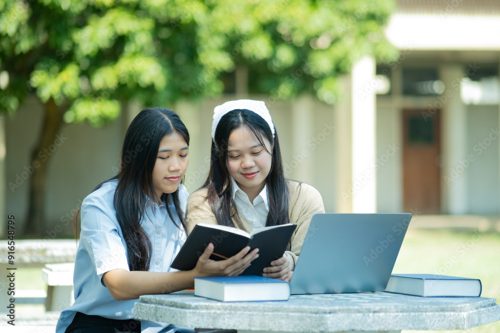 Group of students studying on campus outdoors Group of students studying on campus outdoors