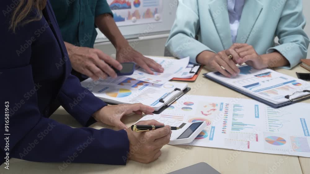 A businessperson, holding hands, cooperate during a corporate meeting. review a graph document together, discussing strategies and financial data to achieve successful outcomes and effective A businessperson, holding hands, cooperate during a corporate meeting. review a graph document together, discussing strategies and financial data to achieve successful outcomes and effective