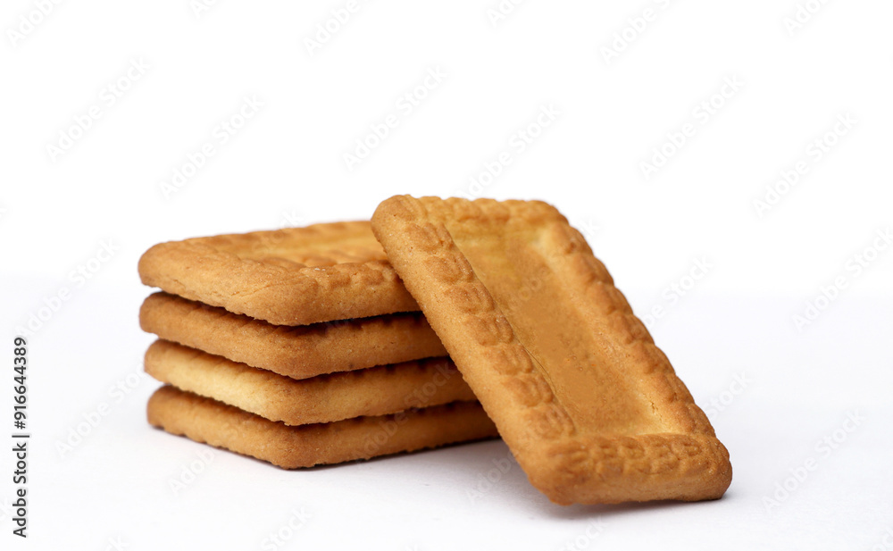 Indian biscuits stacked over white background Indian biscuits stacked over white background
