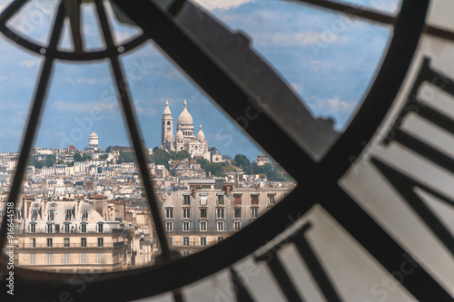 Paris, France - June 16, 2015: Landscape of Paris through the clock tower