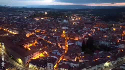 Santiago de Compostela night view with city illumination, aerial view of Spanish city of Santiago de Compostela in the evening, Camino de Santiago