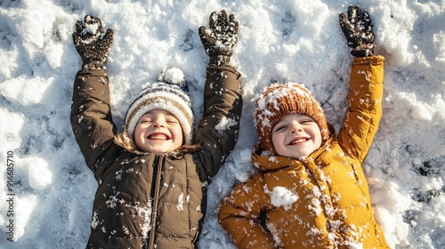 top view kids lying down snow