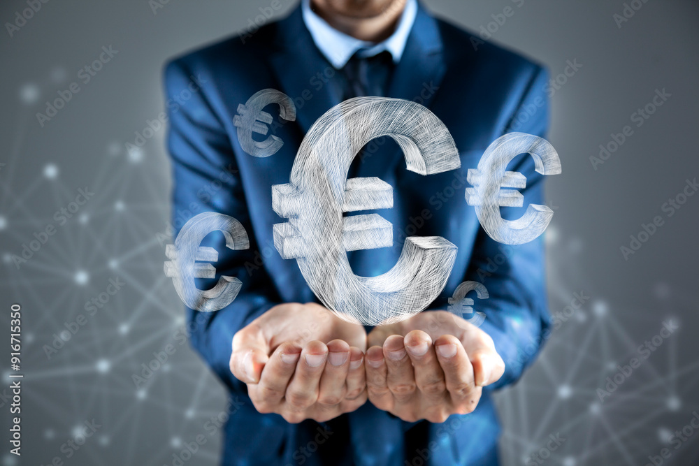 close up of businessman holding euro currency symbol in palm close up of businessman holding euro currency symbol in palm
