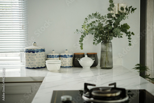 Containers for herbs and spices in domestic kitchen