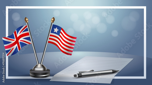 United Kingdom and Liberia Small national flag on bokeh background, cooperative relationship