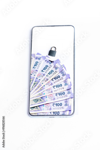 Smart phone and Indian one hundred rupees lock by phone screen isolated on white background