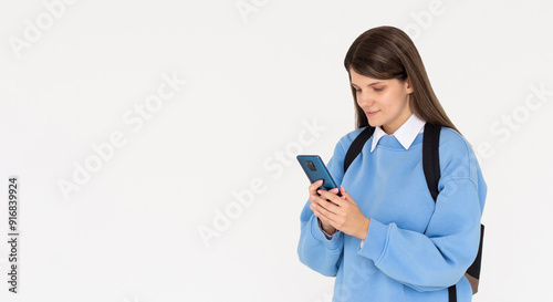 Photo of young caucasian college girl on white background