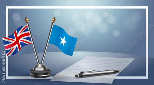 United Kingdom and Somalia Small national flag on bokeh background, cooperative relationship