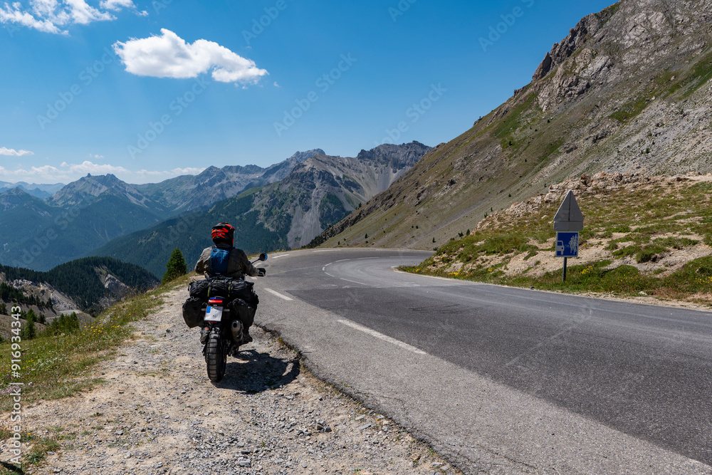 Motorcyclist on the Cold d'Izoard road Motorcyclist on the Cold d'Izoard road