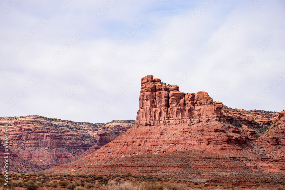 Breathtaking view of a majestic rock formation formed by erosion in the Valley of the Gods, Utah, USA. This picturesque landscape showcases the rugged beauty of nature - USA Breathtaking view of a majestic rock formation formed by erosion in the Valley of the Gods, Utah, USA. This picturesque landscape showcases the rugged beauty of nature - USA