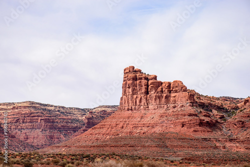 Breathtaking view of a majestic rock formation formed by erosion in the Valley of the Gods, Utah, USA. This picturesque landscape showcases the rugged beauty of nature - USA